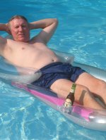 man floating on water summer memories